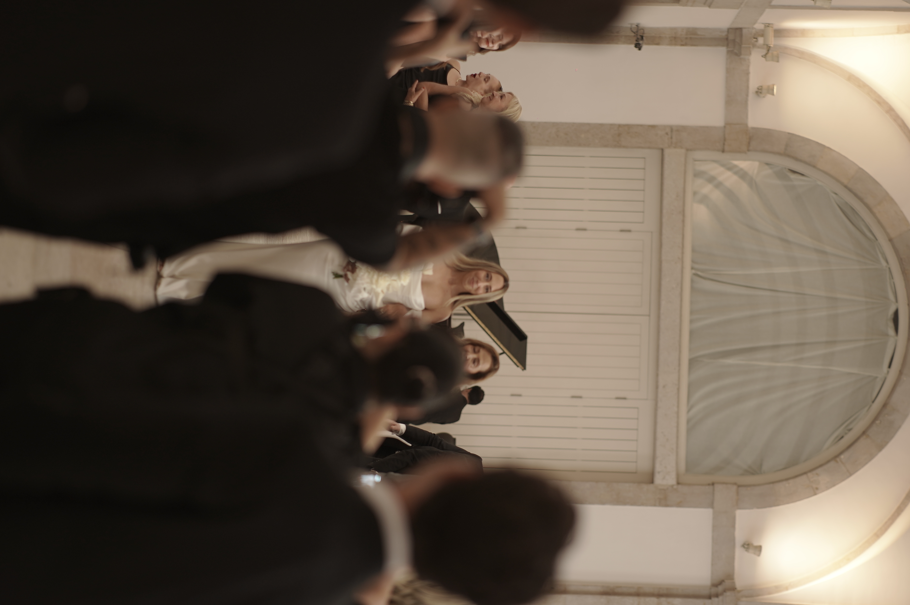 Wedding planners and couples discussing details at a Portuguese venue - collaboration improves day-of photography and film coverage